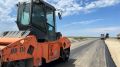 На дороге к Аграханскому заливу укладывают асфальт – готовность 40%